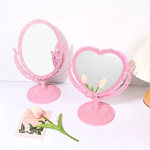 Pink European style heart and oval vanity mirrors with vintage floral carving accents