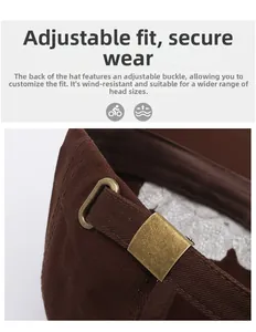 Detail of adjustable brass buckle on vintage washed cotton baseball cap for a secure fit