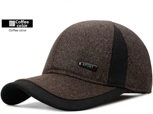 Detail view of coffee and black baseball cap featuring textured fabric and SPORT logo