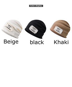 Detailed color display of knitted beanies in beige, black, and khaki with season patch