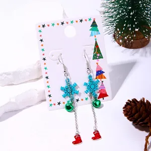 Christmas earrings with snowflake, bell and stocking pendants on long tassel chains
