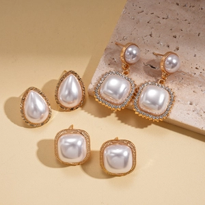 Six-piece gold plated earring set with baroque pearls and teardrop rhinestone studs