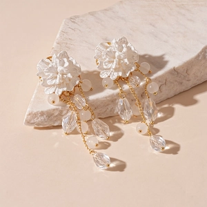 Elegant acrylic flower earrings with glass bead tassels and gold-tone chain fringe
