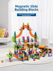Detailed view of colorful magnetic tile marble run track set in a bright home living room