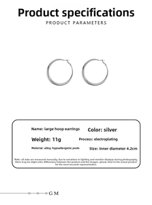 Detailed view of silver hoop earrings showing 4.2cm diameter and electroplating texture