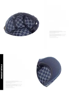 Detail of adjustable metal buckle on blue and white checkerboard denim beret hat