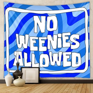 Detail view of Bohemian tapestry featuring No Weenies Allowed text on blue swirl background