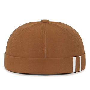 Brown skull cap docker hat with white side stripes and round top in twill cotton