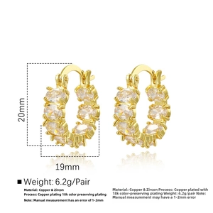 Close-up of 18k gold plated hoop earrings with oval cubic zirconia, size 20mm by 19mm