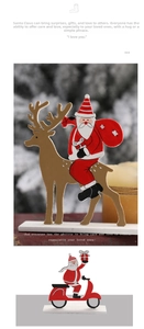 Detail of Nordic wooden Christmas Santa and reindeer table ornament with painted finish