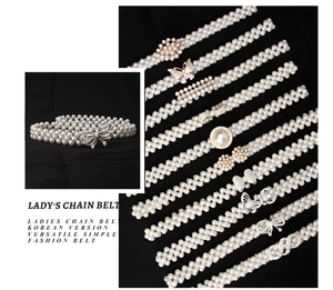 Nahaufnahme von Perlen-Kettengürtel mit eleganten Strass-Schmetterlings-Schnallen