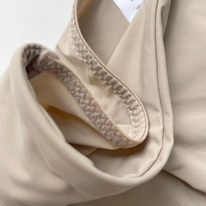 Breathable ice silk seamless panties in beige showing detailed zigzag stitching and texture