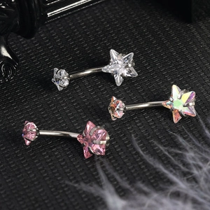 Star-shaped zircon belly rings in white, pink, and iridescent colors on steel bars