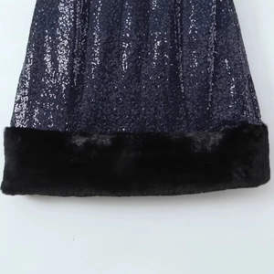 Navy blue sequin dress with black faux fur trim detail and sparkling sleeveless design
