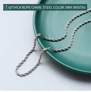 Close-up of a 3mm wide silver stainless steel rope chain with twisted metal texture
