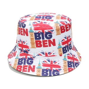 Detail of British flag and Big Ben newspaper print on white canvas bucket hat