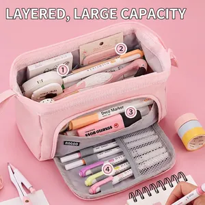 Pink high-capacity canvas pencil case with multi-layer storage and top handle design