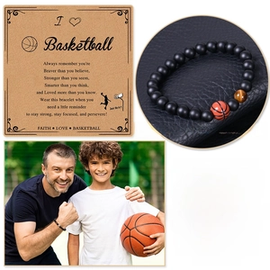 Detail of 8mm natural tiger eye and matte stone basketball bracelet with gift card