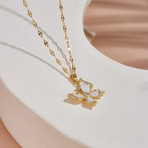Gold plated butterfly necklace with white shell inlay and sparkling cubic zirconia stones