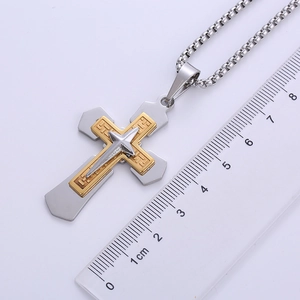 Three-layer vintage punk stainless steel cross pendant measured with a ruler for size