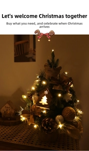 Mini Christmas tree with warm lights, pine cones, and a wooden house on a burlap base
