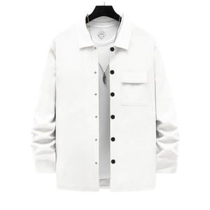 Detailed view of white twill shirt jacket with contrast buttons and front flap pocket