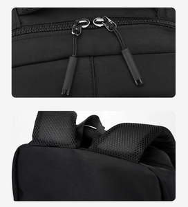 Detail of durable black nylon fabric with double zippers and breathable mesh shoulder straps