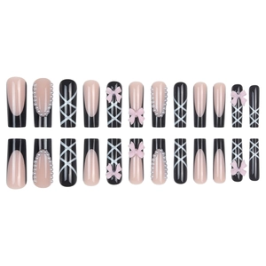 French black and nude long coffin press-on nails with 3D bows and pearl accents