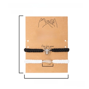 Size detail showing adjustable spider web woven bracelets 16-26cm on kraft card