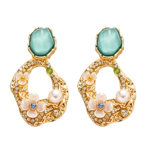 Vintage gold earrings with green gems, white flowers and pearl accents for women