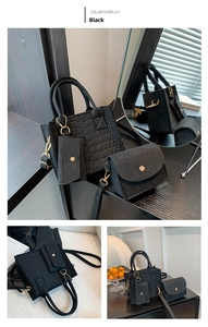 Three-piece black crocodile pattern handbag set with golden hardware and textured finish