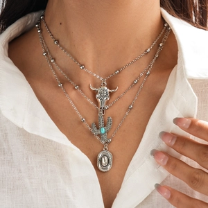 Silver multi-layer necklace set with cow skull and cactus pendants in western style