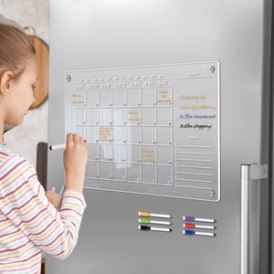 Detailed view of clear acrylic magnetic calendar on fridge with six colorful markers