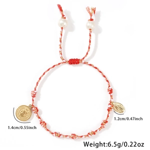 Handwoven red and white cotton rope bracelet with pearl and religious Saint medals