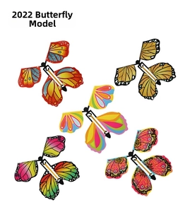 Detailed set of 5 wind-up magic flying butterflies with colorful patterned wings