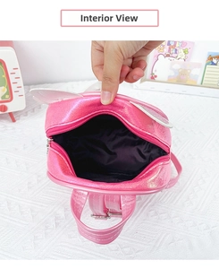 Detailed interior view of the pink glitter cat-ear backpack with black lining and silver zipper