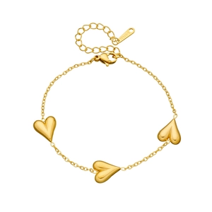 Polished gold plated stainless steel bracelet featuring three heart shaped charms