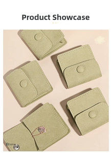 Macro shot of five olive green microfiber jewelry pouches with snap button closures