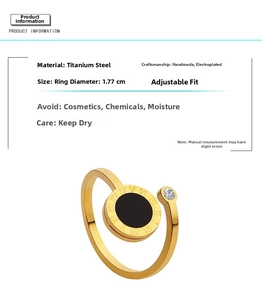 Detail of adjustable roman numeral ring in gold-plated titanium steel with black inlay