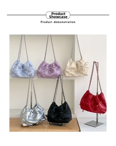 Detailed view of ruched cloud bags featuring 3D bows and silver chain straps in 6 colors