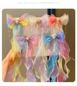 Set of 5 iridescent organza bow hair clips with faux pearl accents and long wavy streamers