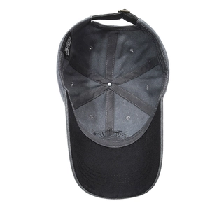 Internal view of a washed cotton baseball cap with 100% cotton label and metal strap
