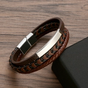 Men's multilayer braided leather bracelet with brown and black cords and silver magnetic clasp
