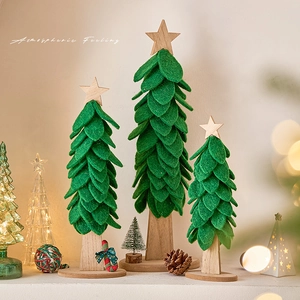 Three-piece forest green felt Christmas tree set with solid wood base for desk decoration