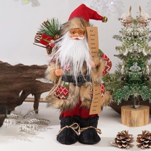 Macro shot of 12-inch Santa Claus figurine with faux fur vest and name scroll detail