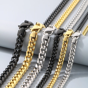 Cuban link chains in gold, silver, and black finishes with lobster clasps detail