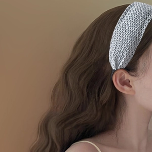 Chic grey braided wide headband for women featuring a stylish knit texture on model