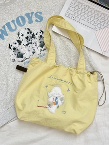 Yellow canvas tote bag with sheep embroidery and drawstring closure for daily fashion style