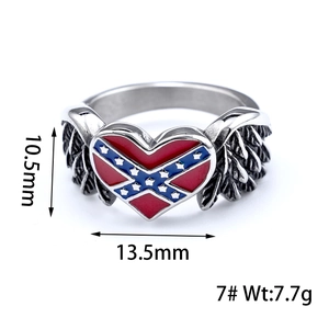 Macro shot showing dimensions of heart ring with wings and polished steel finish