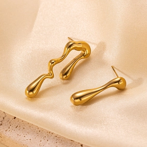 Elegant gold titanium steel fluid earrings in a minimalist abstract style for women